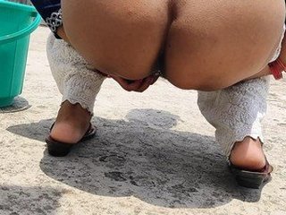 Indian girlfriends sharing intimate moments in the bathroom