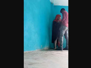 A Muslim woman wearing hijabi lingerie is discovered engaging in sexual activity on camera