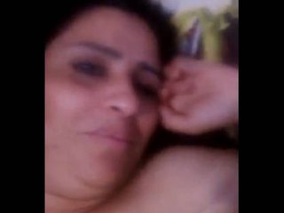 Indian mature woman with timid demeanor