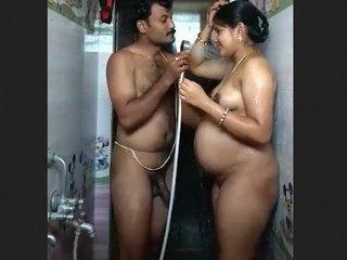 A pregnant woman has sex with an elderly man in a low-quality video