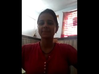 An enticing video featuring a busty Desi woman showcasing her assets