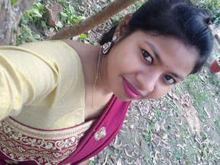 Arousing Indian woman stimulates herself with fingers