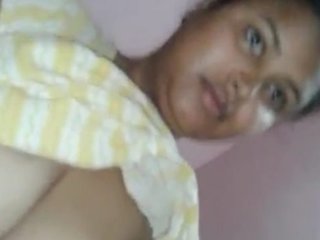 A seductive Indian housewife engages in explicit sexual activity