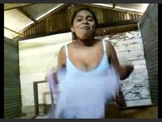 A lovely South Asian wife undresses and displays her attractive features