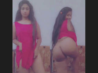 A seductive Indian woman entices with her buttocks