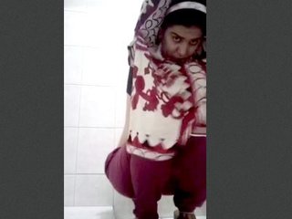 Peeing and playing in the restroom