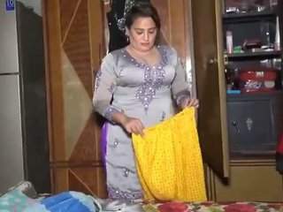 A busty Indian wife misbehaves in this video