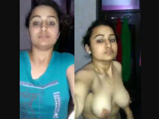 A seductive Indian woman reveals her breasts and stimulates her tight vagina