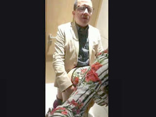 A mature boss engages in covert sexual activity with his secretary in the office restroom