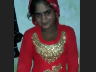 A charming village girl misbehaves in front of the camera