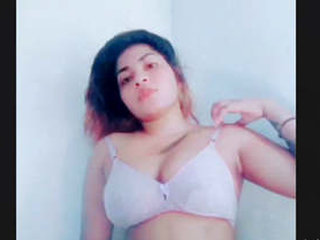 Adorable girl flaunts her stunning attributes