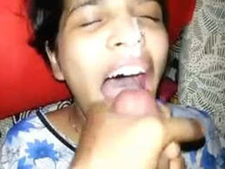 Indian wife in traditional attire skillfully performs oral sex