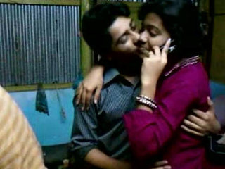 Payel and Biprojit, an Indian pair, engage in a kiss