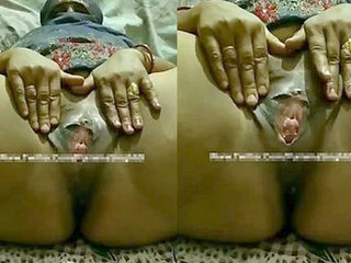 Aroused Punjabi wife stimulates her wet vagina with her fingers