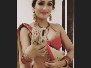 Watch Zoya Rathore's live performance on the app - a stunning display of Asian allure
