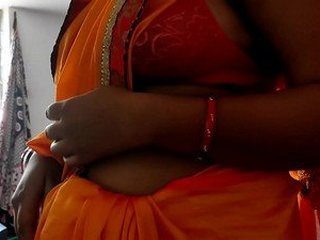 A mature Indian woman and a young boy engage in an intense and passionate film