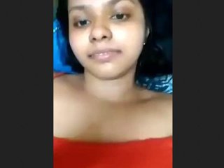 A pretty collegiate lady records a sensual clip featuring herself