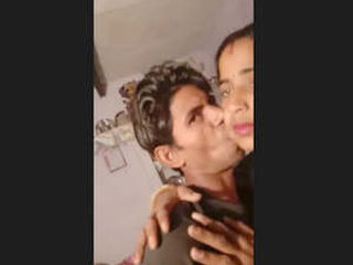 A couple from South Asia engages in passionate standing intercourse