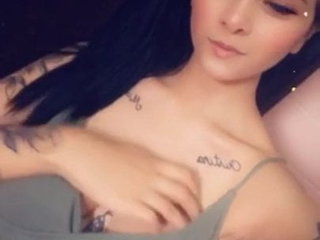 Erotic video featuring stunning American woman with ample assets