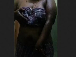 Desi wife indulges in a nude bath while flaunting her ample bosom