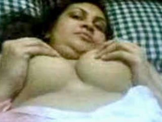 South Asian woman reveals her breasts and vagina