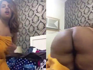 A voluptuous Arab mother undresses seductively for her partner