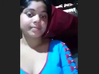 A well-endowed mother displays her large female anatomy