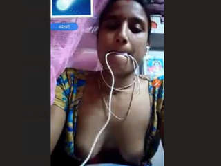 Indian village wife displays her assets