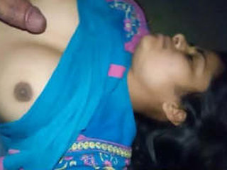 A charming South Asian woman has fun with her boyfriend