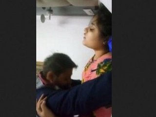 A stunning Asian woman engages in sexual activity with her partner, who happens to be a close friend of her husband. The video highlights the beauty and passion of the encounter.