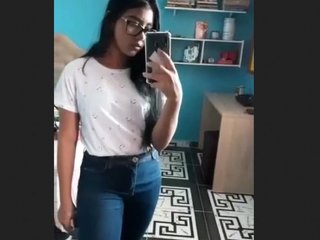 Young woman takes reflective nude photos