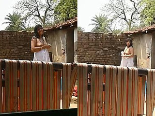 South Asian aunt exposes her breasts outdoors