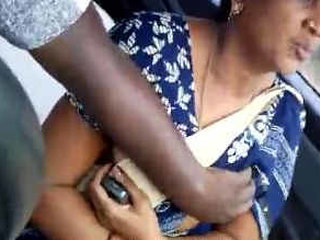 Indian auntie in saree gets her breasts and vagina touched by the chauffeur