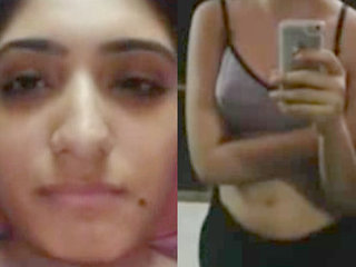 Arousing Indian college beauty undressing and pleasuring herself