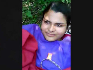 A stunning blonde woman is vigorously penetrated by her partner amidst the wilderness