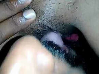 Husband pleasuring Indian spouse with oral stimulation