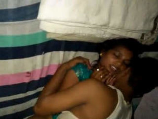 A small-town woman is vigorously penetrated by her lover, captured on camera by a friend