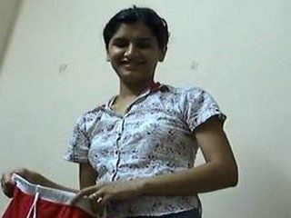Nude Indian girl in clothes after sex in a sexy video