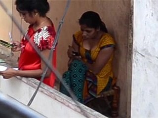 Hidden camera captures Desi man watching from balcony