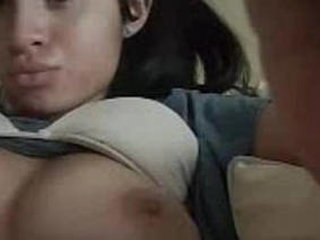 Watch a gorgeous girl flaunt her beautiful breasts in this steamy video