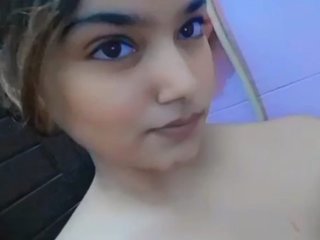 Cute Indian girl in a bathtub