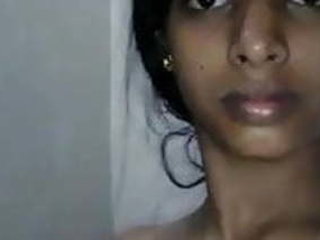 Tamil wife's selfie video showcasing her big boobs and shaved pussy