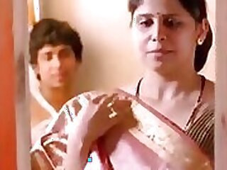 MILF housewife gets frisky with her fake husband in a steamy video