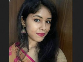 A stunning young woman undergoes a transformation in this video