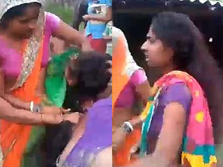 Desi Bhabi's outdoor boob fight turns into a wrestling match
