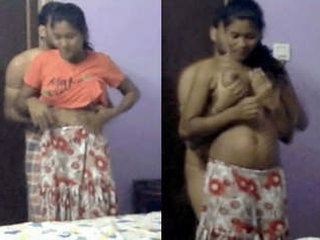 Busty Desi babe squeezes and sucks on her breasts for money
