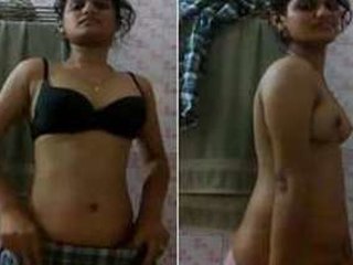 Desi teen gets naked and shows off her XXX charms in the bathroom