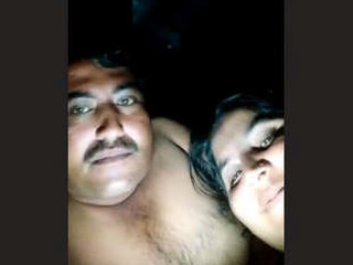 Mature couple in the forest at night