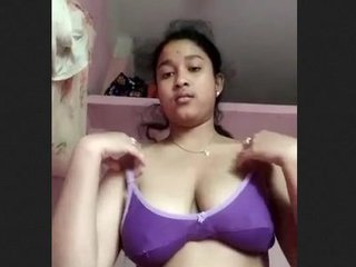 Watch a beautiful Indian girl with big boobs and a perfect pussy