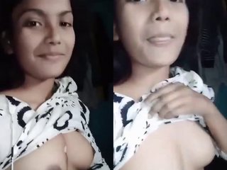 College girl flashes her perky boobs in a steamy video